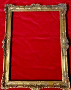 cornice in legno intagliato e dorato con angoli e centri I° XX° sec. luce cm. 54 x 72 est. cm.66 x 88